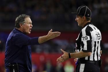 New England Patriots head coach Bill Belichick complains to head linesman Kent Payne (79), during the first half of the NFL Super Bowl 51 football game against the Atlanta Falcons, Sunday, Feb. 5, 2017, in Houston. (AP Photo/Patrick Semansky) ORG XMIT: NFL192