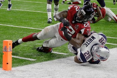 Atlanta Falcons' Keanu Neal pushes New England Patriots' James White out of bounds, during the first half of the NFL Super Bowl 51 football game Sunday, Feb. 5, 2017, in Houston. (AP Photo/Matt Slocum) ORG XMIT: NFL213