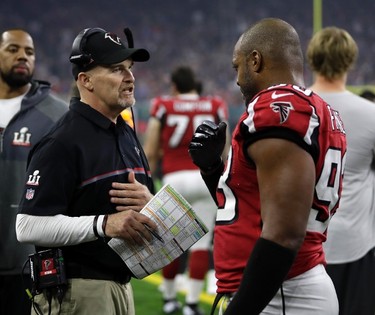 Atlanta Falcons head coach Dan Quinn talks to Dwight Freeney during the second half of the NFL Super Bowl 51 football game against the New England Patriots Sunday, Feb. 5, 2017, in Houston. (AP Photo/Mark Humphrey) ORG XMIT: NFL250