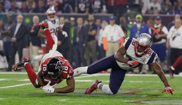 Atlanta Falcons' Taylor Gabriel makes a catch against New England Patriots' Duron Harmon during the second half of the NFL Super Bowl 51 football game Sunday, Feb. 5, 2017, in Houston. (AP Photo/Mark Humphrey) ORG XMIT: NFL254