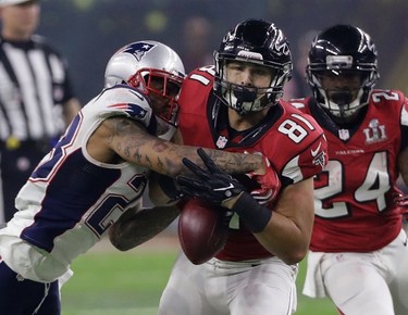 New England Patriots' Patrick Chung breaks up a pass intended for Atlanta Falcons' Austin Hooper (81)during the second half of the NFL Super Bowl 51 football game Sunday, Feb. 5, 2017, in Houston. (AP Photo/David J. Phillip) ORG XMIT: NFL286
