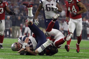 Atlanta Falcons' Grady Jarrett sacks New England Patriots' Tom Brady, during the second half of the NFL Super Bowl 51 football game Sunday, Feb. 5, 2017, in Houston. (AP Photo/Matt Slocum) ORG XMIT: NFL300