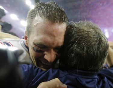 New England Patriots' Tom Brady celebrates with head coach Bill Belichick after winning the NFL Super Bowl 51 football game against the Atlanta Falcons in overtime Sunday, Feb. 5, 2017, in Houston. The Patriots won 34-28. (AP Photo/David J. Phillip) ORG XMIT: NFL371