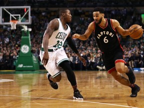 Raptors guard Cory Joseph (right) drives against Terry Rozier of the Celtics during NBA action in Boston on Feb. 1, 2017. (Maddie Meyer/Getty Images)