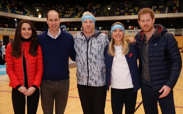 Kate, the Duchess of Cambridge,Prince William, athlete Iwan Thomas, athlete Paula Radcliffe and Prince Harry from left, pose for a photograph at the Copper Box during a training event to promote the charity Heads Together, at the Queen Elizabeth II Park in London, Sunday, Feb. 5, 2017. (AP Photo/Alastair Grant, Pool)