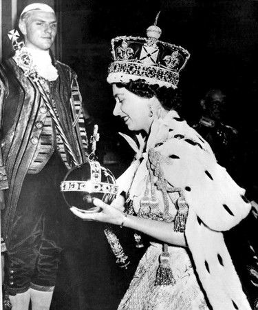 FILE - In this June 2, 1953 file photo, Britain's Queen Elizabeth II wearing the bejeweled Imperial Crown and carrying the Orb and Scepter with Cross, leaves Westminster Abbey, London, at the end of her coronation ceremony. On Monday Feb. 6, 2017, Queen Elizabeth II marks her Sapphire Jubilee, becoming the first British monarch to reign for 65 years. (AP Photo/File)