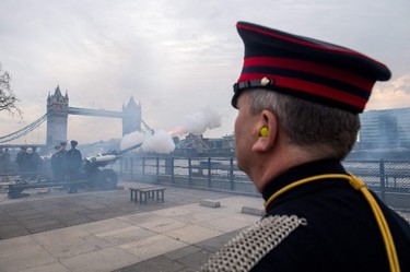 Members of the Honourable Artillery Company fire a 62 round royal gun salute from the Gun Wharf outside the Tower of London with Tower Bridge seen in the background to mark the anniversary of Queen Elizabeth II's accession to the throne in London on February 6, 2017. 
Queen Elizabeth II, the world's longest-reigning monarch, set a new record Monday as the first British sovereign to reach their sapphire jubilee, marking 65 years on the throne. / AFP PHOTO / CHRIS J RATCLIFFECHRIS J RATCLIFFE/AFP/Getty Images