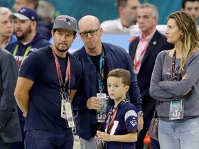 Actor Mark Wahlberg (L) attends Super Bowl 51 between the New England Patriots and the Atlanta Falcons at NRG Stadium on February 5, 2017 in Houston, Texas. (Photo by Jamie Squire/Getty Images)