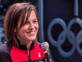Former short-track speedskater Isabelle Charest listens as she is presented as Canada's chef de mission for the Olympic Games in PyeongChang, South Korea, on Feb. 6, 2017. (THE CANADIAN PRESS/Paul Chiasson)