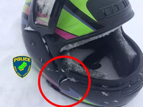 A couple driving a snowmobile in west Quebec on Saturday suffered injuries after their snowmobile flipped on a trail. The woman's helmet was broken under the force of impact.