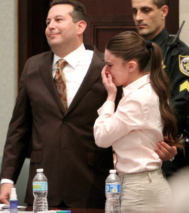 Casey Anthony cries with her attorney Jose Baez after she was acquitted of murder charges at the Orange County Courthouse on July 5, 2011 in Orlando, Fla.  (Red Huber-Pool/Getty Images)