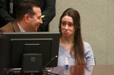 Casey Anthony (R) sits with her attorney Jose Baez during her sentencing hearing on charges of lying to a law enforcement officer at the Orange County Courthouse July 7, 2011 in Orlando, Fla. (Joe Burbank-Pool/Getty Images)