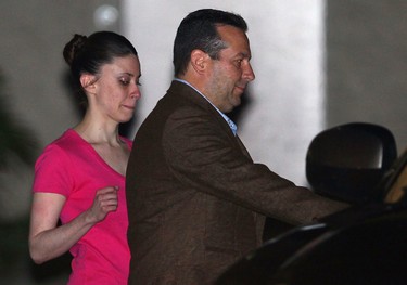 Casey Anthony (L) and her defence attorney Jose Baez leave the Booking and Release Center at the Orange County Jail after she was acquitted of murdering her daughter Caylee Anthony on July 17, 2011 in Orlando, Fla.  (Photo by Mark Wilson/Getty Images)