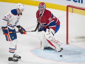 Edmonton Oilers forward Leon Draisaitl scores against Montreal Canadiens goaltender Al Montoya during a shootout in Montreal on Sunday, Feb. 5, 2017. (Graham Hughes/The Canadian Press)