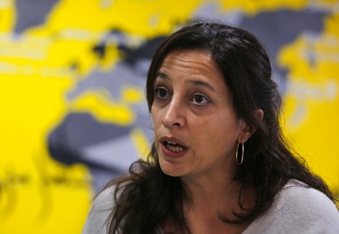 Lynn Maalouf, deputy director of research at Amnesty International Middle East and North Africa, speaks during an interview with The Associated Press in Beirut, Lebanon, Monday, Feb. 6, 2017. Amnesty International says Syrian authorities killed at least 13,000 people in mass hangings at a prison north of Damascus known to detainees as the “slaughterhouse.” The group released a report covering the period from the start of the 2011 uprising until 2015, during which Amnesty says groups of 20 to 50 people were hanged at Saydnaya Prison, once or twice a week, in killings authorized by senior officials, including deputies of President Bashar Assad. (AP Photo/Bilal Hussein)