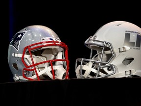 New England Patriots helmet and a helmet with the Super Bowl LI decal on February 6, 2017 in Houston, Tex. (Bob Levey/Getty Images)