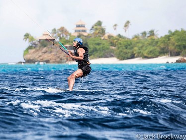 In this recent but undated photo made available by Virgin.com, former U.S President Barack Obama kitesurfs during his stay on Moskito Island, British Virgin Islands. The former president and his wife stayed on Mosikto Island owned by Richard Branson, founder of the Virgin Group, after he finished his second term as President and left the White House. (Jack Brockway/Virgin.com via AP) ORG XMIT: LON108