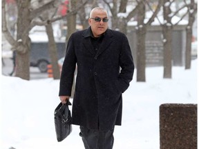 Former construction boss and spy Roland Eid walks in to the Ottawa court on Tuesday. JEAN LEVAC / POSTMEDIA NEWS