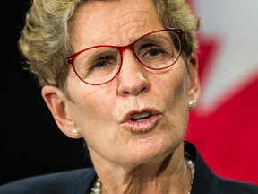 Premier Kathleen Wynne says she doesn’t know why businesses are so much more confident in their own growth than in the province’s, but she says Ontario is leading the country in economic growth this year. (TORONTO SUN/FILES)