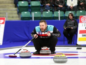 Charley Thomas calls for his teammates to hurry hard during Team Thomas's game against Team Koe in the Boston Pizza Cup final in Camrose, Alta. on Sunday February 14, 2016. Team Koe went on win the game 8-4 in nine ends to win the championship for the fifth time since 2010.