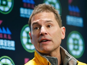 Boston Bruins interim coach Bruce Cassidy speaks during a news conference in Boston on Tuesday. The Bruins fired Stanley Cup-winning coach Claude Julien on Tuesday, with the team in danger of missing the playoffs for a third straight season. (AP Photo/Michael Dwyer)