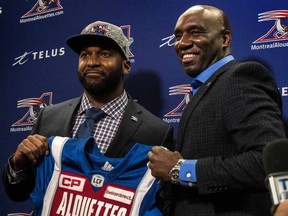 Alouettes GM Kavis Reed (right) introduced the team's new quarterback Darian Durant to the media at Olympic Stadium in Montreal on Jan. 20, 2017. (Dave Sidaway/Postmedia Network)