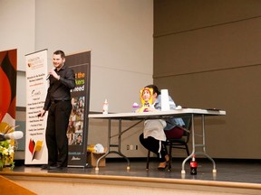 Crystal Jackson takes the stage with Allan Kehler, B.Ed., B.PhEd, for a stress exercise, at the first annual Work-Stress-Life: Striking a Balance Conference and Wellness Fair at the Vermilion Regional Centre on Tuesday, January 31, 2017, in Vermilion, Alta.  Taylor Hermiston/Vermilion Standard/Postmedia Network.