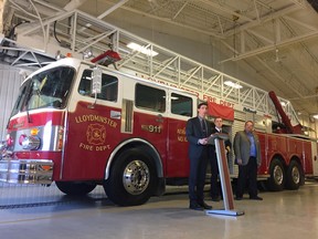 Michael Crowe (centre), Lakeland College's vice president of academic, speaks to members of the City of Lloydminster, Lloydminster Fire Department and members of the media during a ceremony, which saw the Lloydminster Fire Department donate an aerial unit to Lakeland's Emergency Training Centre on Wednesday, Feb. 1, 2017 at Station No. 2 in Lllydminster, Alta. Fire Chief Jordan Newton and Mayor Gerald Aalbers is pictured to the right. Eric Healey/Lakeland College