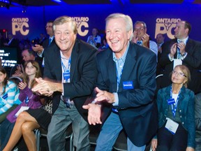 Former Conservative premiers Mike Harris and Ernie Eves applaud as Ontario Conservative Leader Tim Hudak delivers the keynote address at the Ontario PC convention held at the Toronto Congress Centre on May 28, 2011. (ERNEST DOROSZUK/Postmedia Network)