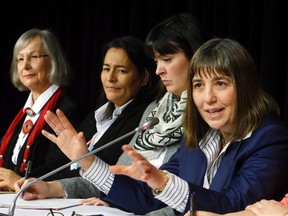 Marion Buller, (left to right ) Chief Commissioner of the National Inquiry into Missing and Murdered Indigenous Women and Girls, and commissioners Michele Audette, and Qajaq Robinson, and Susan Vella, lead legal counsel for the commission, hold a news conference in Ottawa on Tuesday, February 7, 2017 THE CANADIAN PRESS/Fred Chartrand