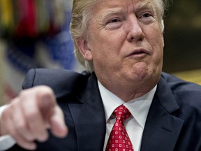U.S. President Donald Trump speaks as he meets with county sheriffs during a listening session in the Roosevelt Room of the White House on February 7, 2017 in Washington, D.C. The Trump administration will return to court Tuesday to argue it has broad authority over national security and to demand reinstatement of a travel ban on seven Muslim-majority countries that stranded refugees and triggered protests. (Photo by Andrew Harrer - Pool/Getty Images)