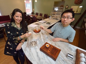 Michelle Pierce Hamilton and Yixing Tang are co-owners of London?s new Tea Lounge, which features exotic decor from India and China. (MORRIS LAMONT, The London Free Press)