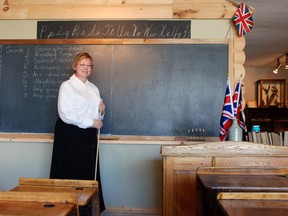 The Oxford County Museum School in Ingersoll has been awarded a $10,000 grant under the Ontario 150 Community Capital Program administered by the Trillium Foundation. The money will be used to upgrade the building's HVAC system. Seen in this file photo is Jennifer Beauchamp, who was dressed as a school marm for the opening of the facility after it was moved from Burgessville. POSTMEDIA NETWORK FILE PHOTO
