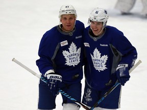 Leafs forwards Leo Komarov (left) and Mitch Marner (right) skate at Maple Leafs practice in Toronto on Jan. 30, 2017. (Dave Abel/Toronto Sun)