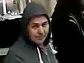 Security camera image of a man accused in a string of Toronto fast-food robberies. (HANDOUT)
