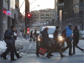 Pedestrians walk on McGill College Avenue in Montreal, Feb. 8, 2012. (Vincenzo D'Alto/THE MONTREAL GAZETTE)