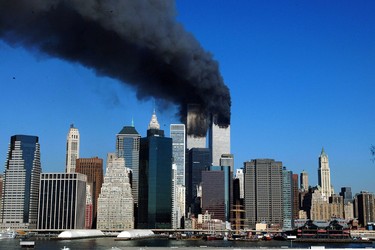 (FILES) This file photo taken on September 11, 2001 shows  the Twin Towers of the World Trade Center in New York billowing smoke after hijacked airliners crashed into them.  The towers collapsed on that day claiming 2,753 lives. September 11, 2016 marks the fifteenth anniversary of the event. / AFP PHOTO / HENNY RAY ABRAMSHENNY RAY ABRAMS/AFP/Getty Images