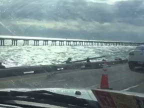 A guardrail on the Chesapeake Bay-Bridge Tunnel is damaged. This is where a tractor trailer was blown off the bridge. (Screengrab)