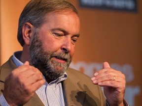 Federal NDP leader Thomas Mulcair speaks with the media at Federal NDP caucus at the Fairmont Hotel MacDonald in Edmonton, Sept. 10, 2014. (Ian Kucerak/Edmonton Sun/Postmedia Network)