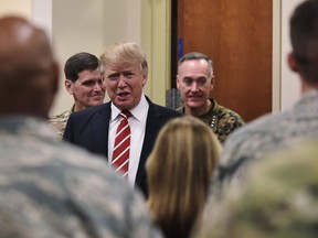 U.S. President Donald Trump arrives for lunch with troops during a visit to the U.S. Central Command at MacDill Air Force Base on February 6, 2017 in Tampa, Florida. (MANDEL NGAN/AFP/Getty Images)