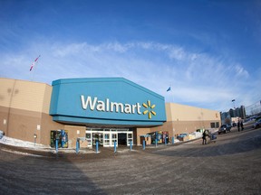 The front entrance of the Walmart in downtown Fort McMurray Alta. on Friday January 13, 2017. Walmart Canada was hit with 174 counts of Public Health Act violations related to the handling of food at their Fort McMurray store following May's wildfire. Robert Murray/Fort McMurray Today/Postmedia Network