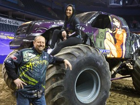 Darren Migues and his daughter Kaylyn, from Kansas City, Kan., will be driving their monster trucks at Budweiser Gardens in London this weekend. (MIKE HENSEN, The London Free Press)