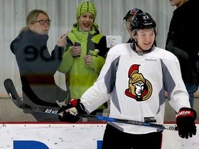 Fans and Curtis Lazar have a good time at practice yesterday.