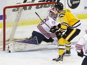 Sarnia Sting forward Brock Perry has his backhand shot stopped by Oshawa Generals goalie Jeremy Brodeur during the Ontario Hockey League game at Progressive Auto Sales Arena on Friday, Feb. 10, 2017 in Sarnia, Ont. Brodeur turned aside 31 shots in team's 5-3 victory. (Terry Bridge/Sarnia Observer)