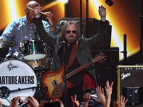 Musicians Steve Ferrone (L) and Tom Petty perform onstage during MusiCares Person of the Year honouring Tom Petty at the Los Angeles Convention Center on Feb.  10, 2017 in Los Angeles. (Kevork Djansezian/Getty Images)