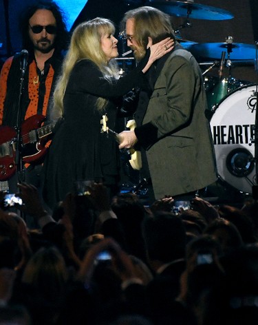 Stevie Nicks, left, and honouree Tom Petty perform "Stop Draggin' My Heart Around" at the MusiCares Person of the Year tribute at the Los Angeles Convention Center on Friday, Feb. 10, 2017. (Photo by Chris Pizzello/Invision/AP)