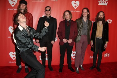 Daniel Tichenor, Jared Champion, Matt Shultz, Brad Shultz, Nick Bockrath, and Matthan Minster of Cage the Elephant on the red carpet for the MusiCares 2017 Person of the Year Dinner in Los Angeles on Feb. 11, 2017. (FayesVision/WENN.com)