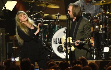 Stevie Nicks, left, and honouree Tom Petty perform "Stop Draggin' My Heart Around" at the MusiCares Person of the Year tribute at the Los Angeles Convention Center on Friday, Feb. 10, 2017. (Chris Pizzello/Invision/AP)