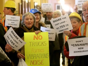 Dozens of protesters from Rockcliffe gathered at city hall in Ottawa last month to protest the new combined sewage tunnel cutting through a park.