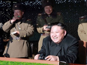 North Korean leader Kim Jong-Un (front C) is seen in a file photo during a combat drill of the service personnel of the special operation battalion of the Korean People's Army Unit 525.    (KNS/AFP/Getty Images)